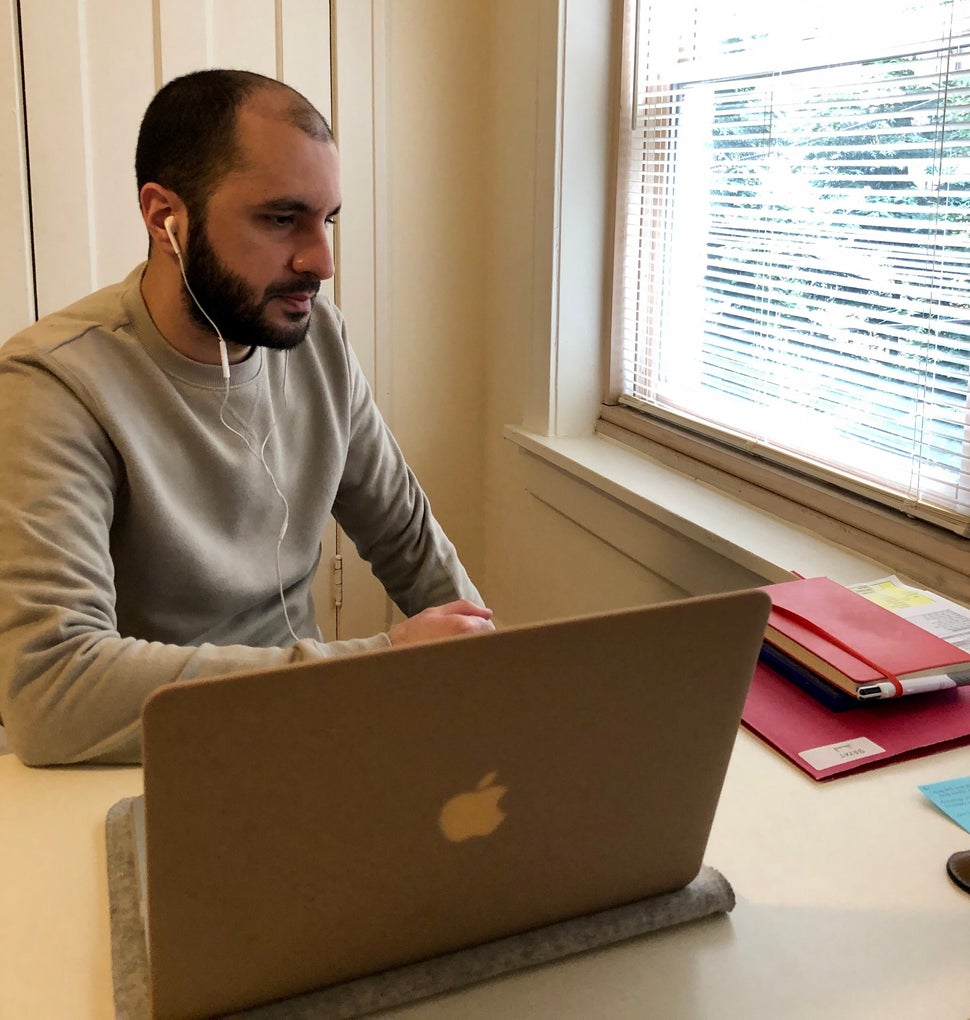 Imam Jawad Bayat, a chaplain at the Cleveland Clinic, conducts a telehealth session with a patient.