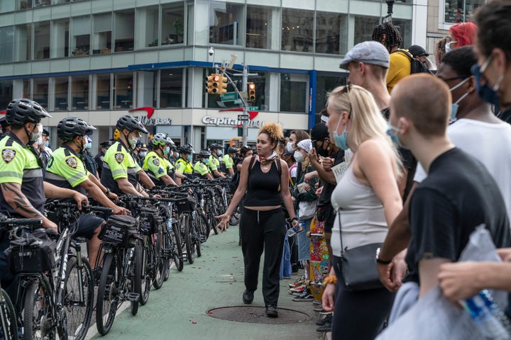 Police at a demonstration Thursday in New York City wore typical uniforms and bike helmets.