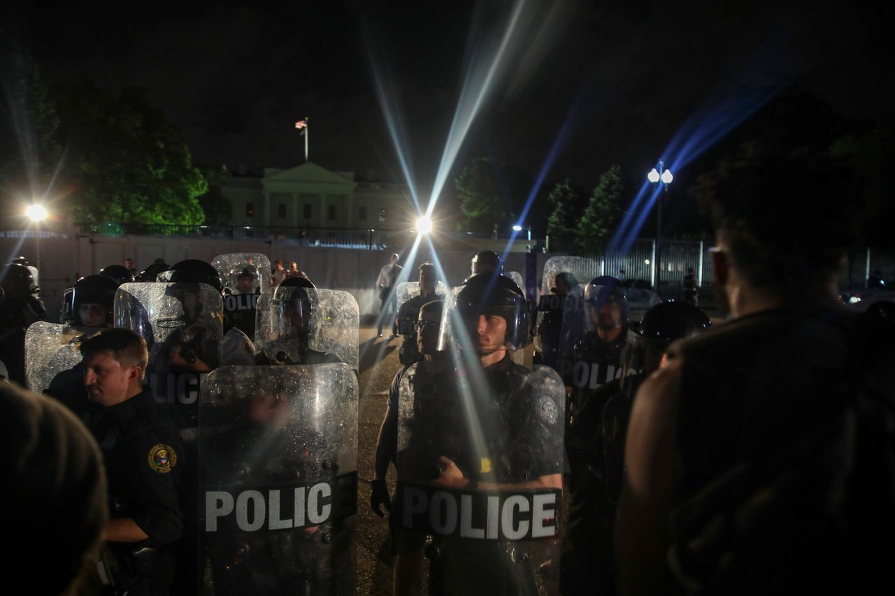 Police work to keep demonstrators back during a protest in Lafayette Square Park near the White House on May 29.