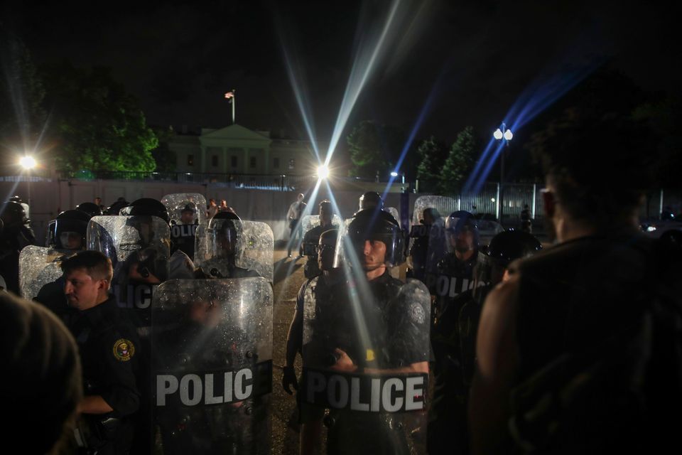 Police work to keep demonstrators back during a protest in Lafayette Square Park near the White House on May 29.