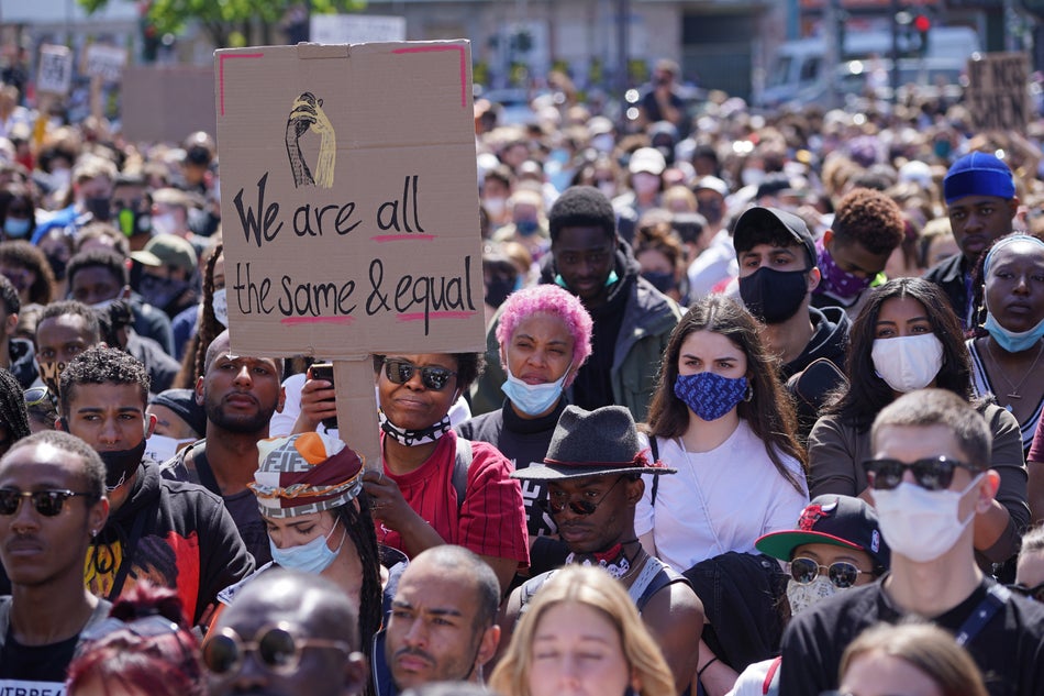 People attend a protest rally against racism on May 31, 2020 in Berlin.