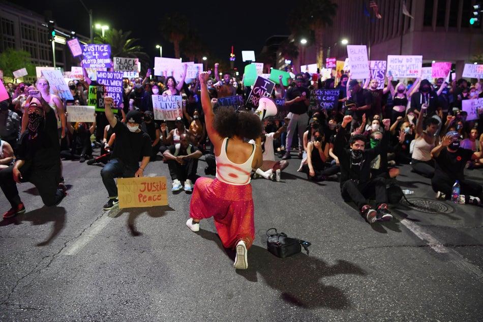 Protesters attend a demonstration demanding justice for the death of George Floyd on May 30, 2020 in Las Vegas.