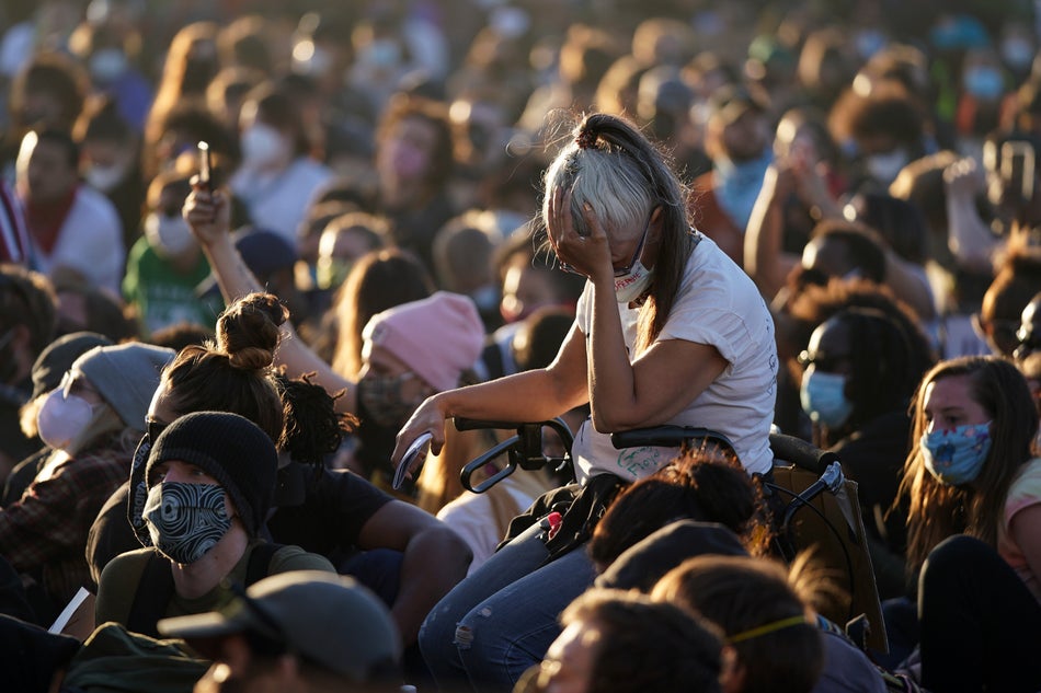 Protesters gathered near the Minneapolis police 5th Precinct in the hours before curfew on May 30, 2020.