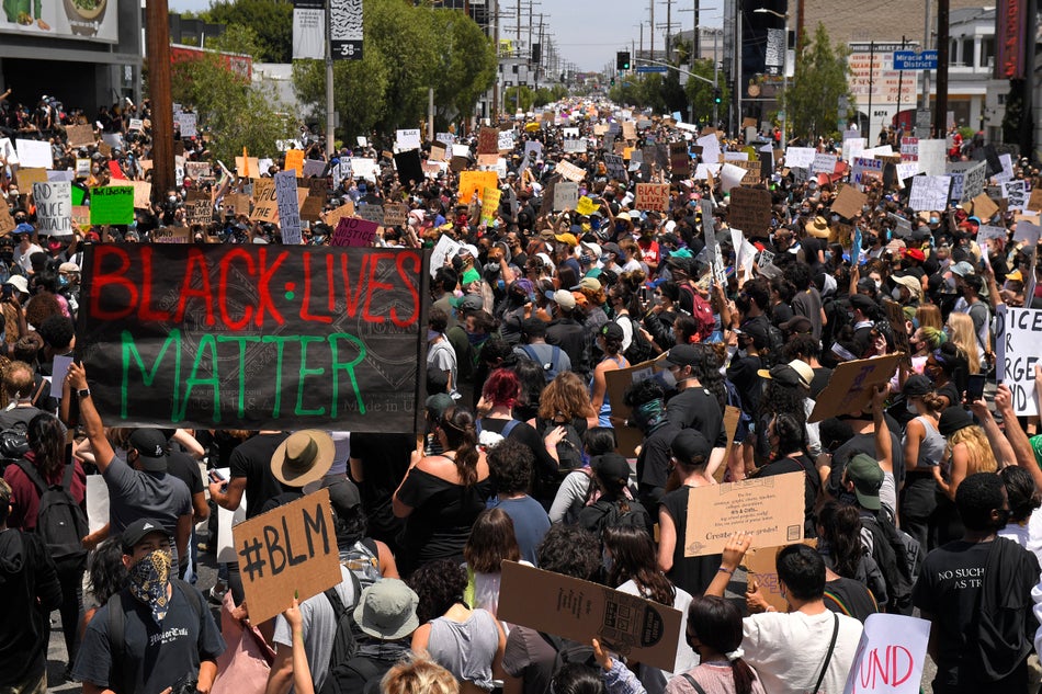 Demonstrators sit in an intersection on May 30, 2020 in Los Angeles.