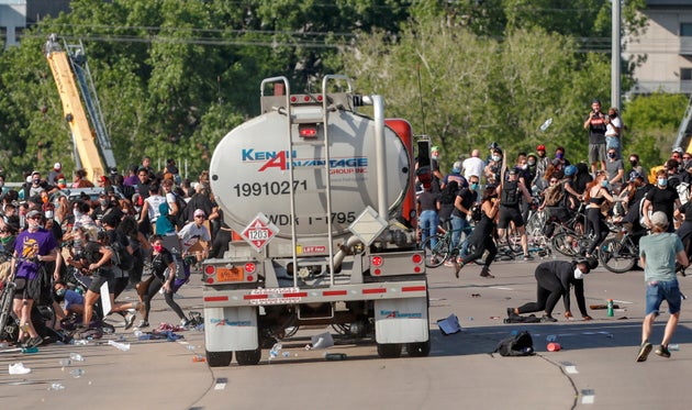 A tanker truck drives into thousands of protesters marching on 35W north bound highway during a protest against the death of George Floyd, in Minneapolis, Minnesota.