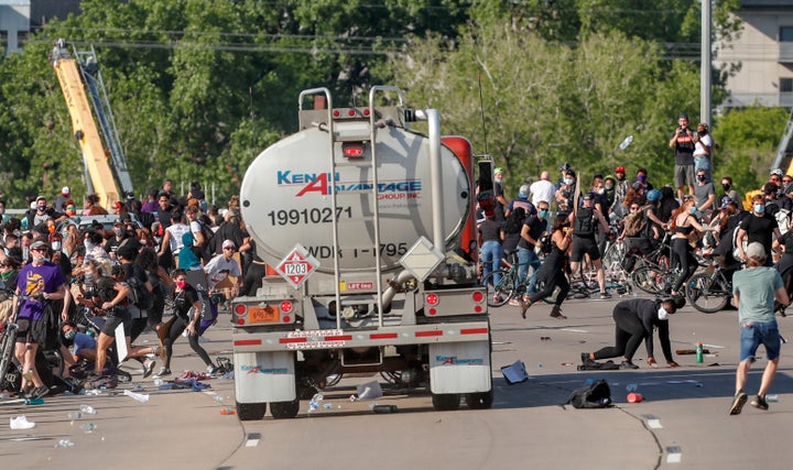 A tanker truck drives into thousands of protesters marching on 35W north bound highway during a protest against the death of George Floyd, in Minneapolis, Minnesota.