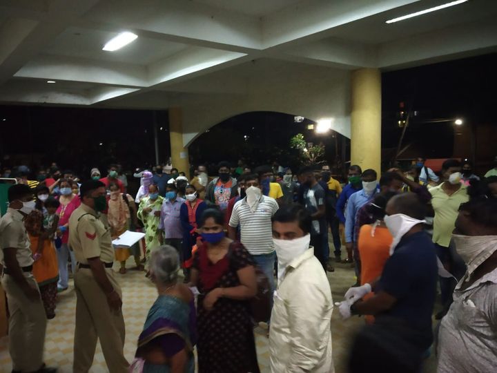 Travellers from Maharashtra waiting to be tested outside the North Goa District Hospital on Thursday night. The wait lasted hours for most of them. Hospital administration had to call police to handle the crowds. On Saturday the Goa government dispatched 40 additional staff to collect throat and nasal swabs.