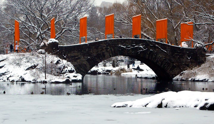 "The Gates" art installation created by Christo and Jeanne-Claude lines a snow-covered bridge in New York's Central Park in 2005. 