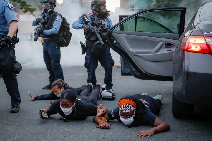 Protests continued following the death of George Floyd, who died after being restrained by Minneapolis police officers on Memorial Day. (AP Photo/John Minchillo)