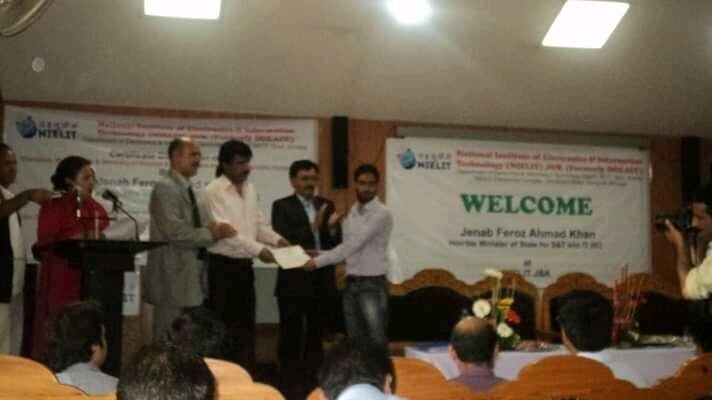 Saifullah Mir, appointed chief operations commander of the Hizbul Mujahideen in Kashmir, receiving a certificate of excellence for repairing medical equipment in 2014 from J&K's then Science and Technology Minister Feroz Ahmad Khan.