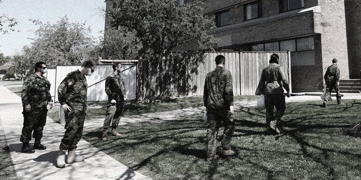 Military personnel change shifts at a Toronto long-term care home on May 26, 2020. They've taken over Ontario homes struggling to cope with the pandemic.