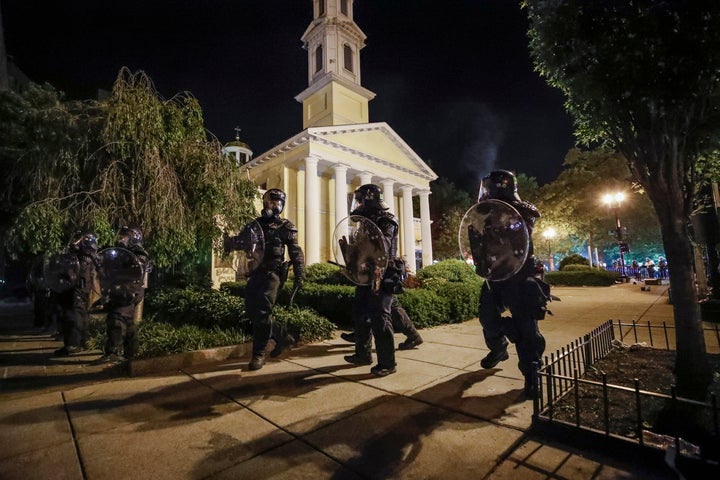 Police form a line in front of St. John's Episcopal Church on May 31, 2020, near the White House in Washington.