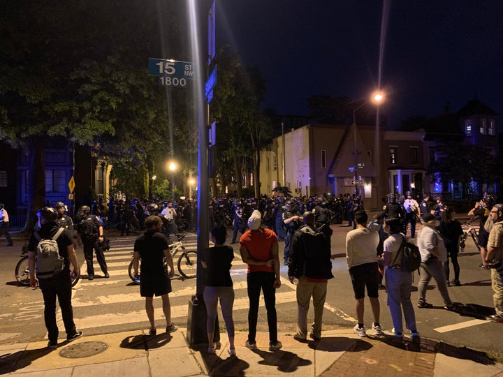 Police trap demonstrators on Swann Street NW in Washington, D.C.