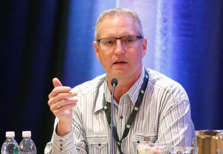 Suncor Energy president and CEO Mark Little speaks at the TD Securities Calgary Energy Conference in Calgary, July 9, 2019. 