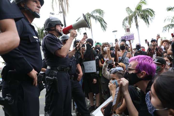 Los Angeles Police Chief Michel Moore addresses protesters over the weekend. 