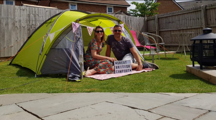 Amy camping, for the first time, in her garden, raising money for the NHS