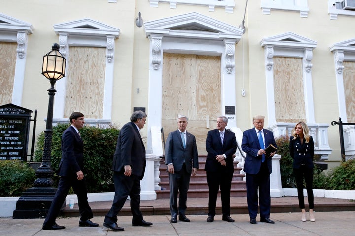 Trump stands outside St. John's Church on Monday with Defense Secretary Mark Esper, Attorney General Bill Barr, national security adviser Robert O'Brien, White House chief of staff Mark Meadows and White House press secretary Kayleigh McEnany.