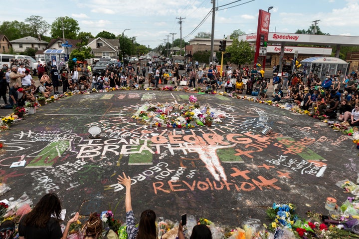 People gather on June 1 at the site in Minneapolis where George Floyd died on May 25 while in police custody.