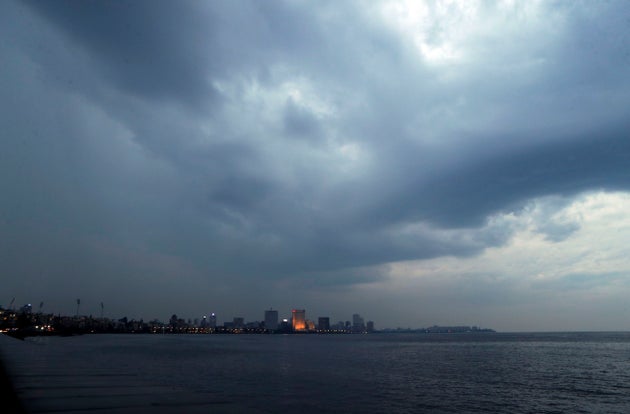 Rain clouds fill the sky on the Arabian Sea coast in Mumbai, June 2,