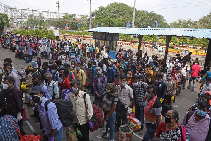 Passengers queue up to enter Howrah station on June 1, 2020 in Kolkata, India.