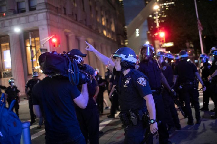 A police officer shouts at Associated Press videojournalist Robert Bumsted on June 2, 2020, in New York.