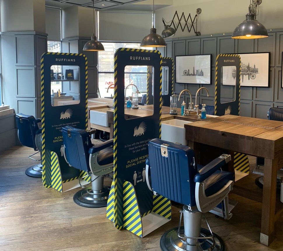 Screens break up seating in Ruffians salon, Edinburgh.