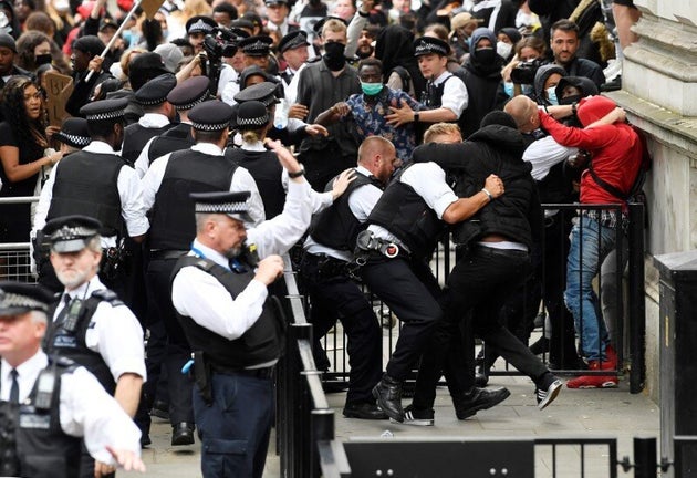 Anti-Racist Protests Grow Outside Downing Street As Boris Johnson Holds Coronavirus Press Briefing