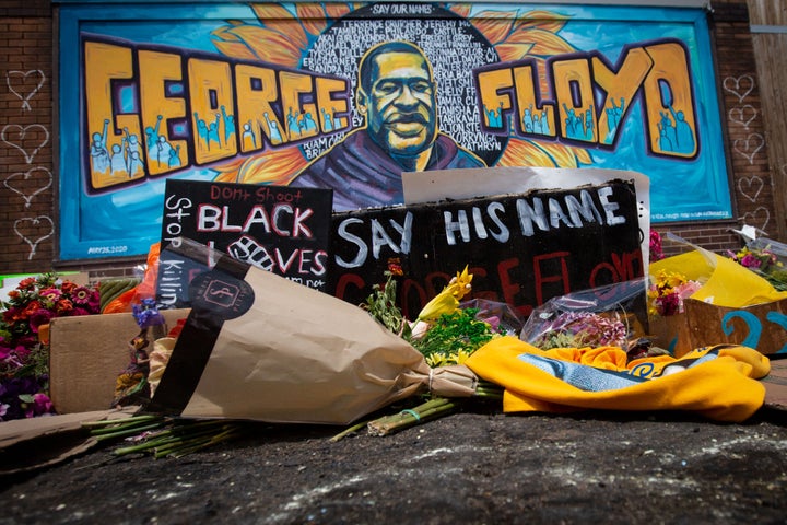 People fill the intersection in front Cup Foods, where George Floyd was killed while in police custody.