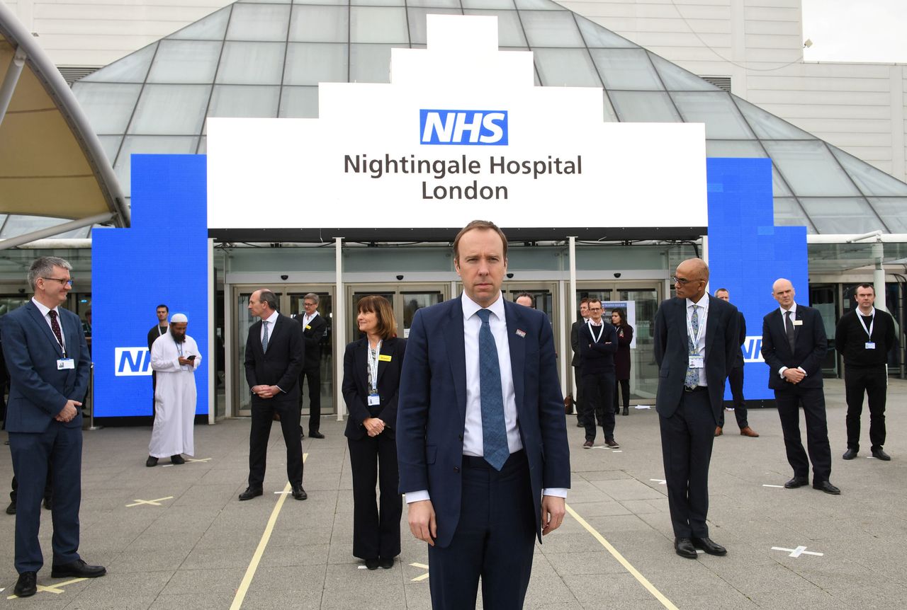 Health secretary Matt Hancock and NHS staff at the opening of the NHS Nightingale hospital in London