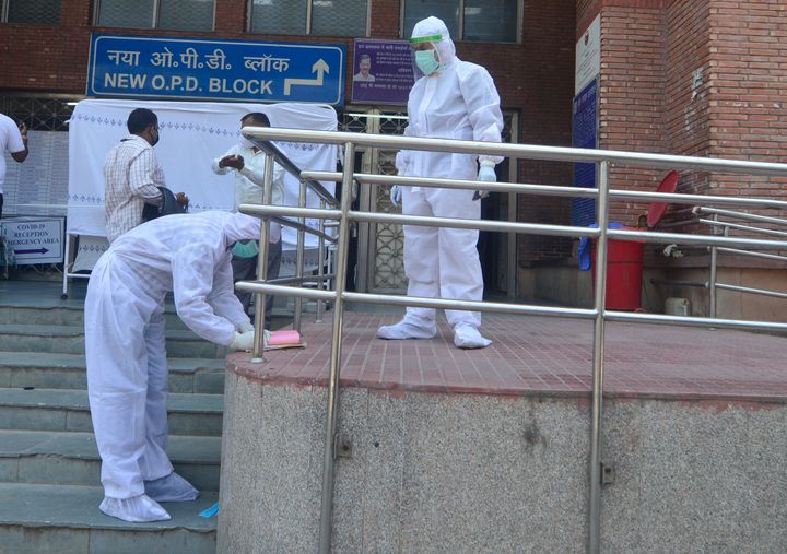 Health workers and doctors at New Delhi's LNJP Hospital during the nationwide lockdown in May.