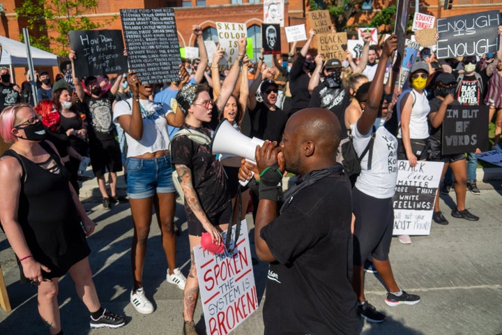 A speaker at a protest near Music Hall on Wednesday, the sixth consecutive day of demonstrations in Cincinnati, Ohio.