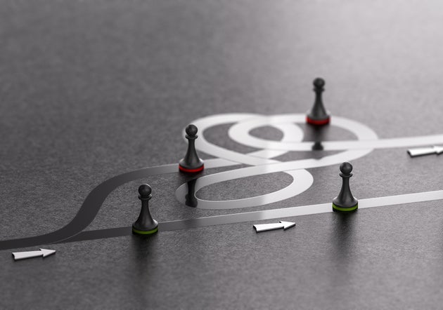 3D illustration of green pawns choosing the best way forward instead of the worst one. Right path concept