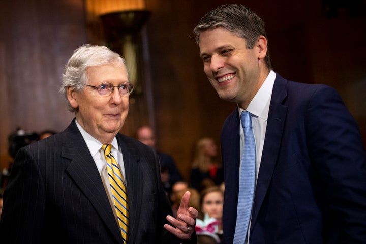 Sen. Mitch McConnell (R-Ky., left) chats with Justin Walker ahead of his Senate confirmation hearing.