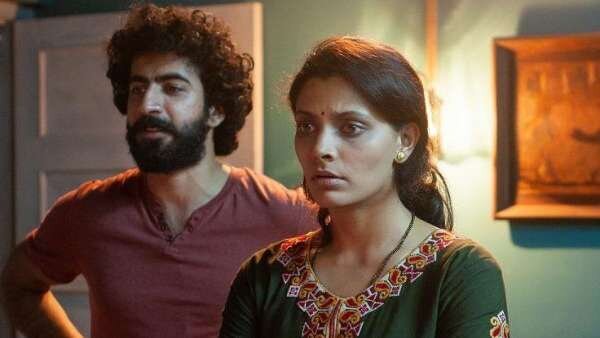 Roshan Mathew and Saiyami Kher in a still from 'Choked: Paisa Bolta Hai"