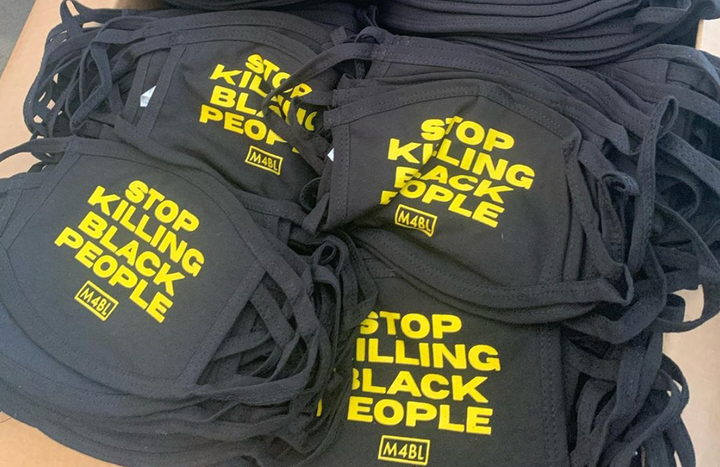 Cloth masks that read "Stop killing Black people" and were intended to protect demonstrators from COVID-19 were seized by law enforcement.