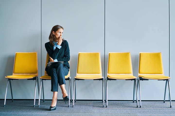 Stressful young woman waiting for job interview