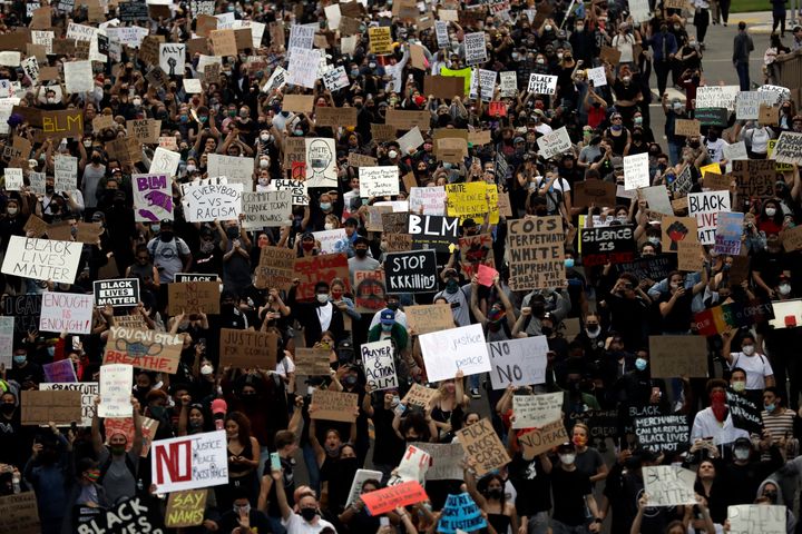 Protesting could get you fired depending on who you work for and where you live. Above, protesters march Thursday, June 4, 2020, in San Diego.