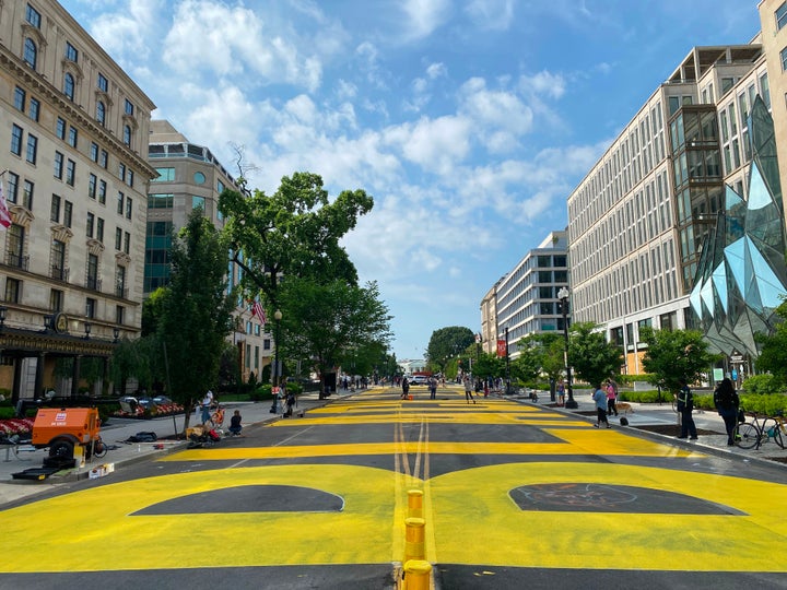 The district government ordered streets near the White House painted with a giant Black Lives Matter sign on Friday. The streets were previously occupied by federal forces.