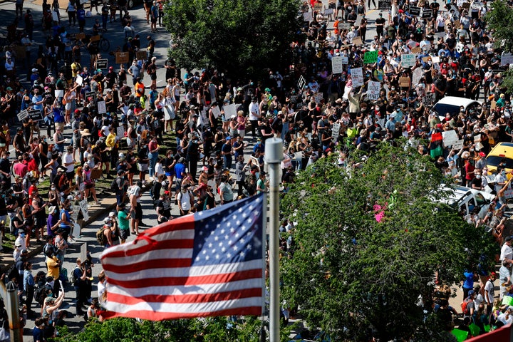 The current wave of protests, like this gathering outside St. Louis' City Justice Center on June 1, is generally supported by Americans.