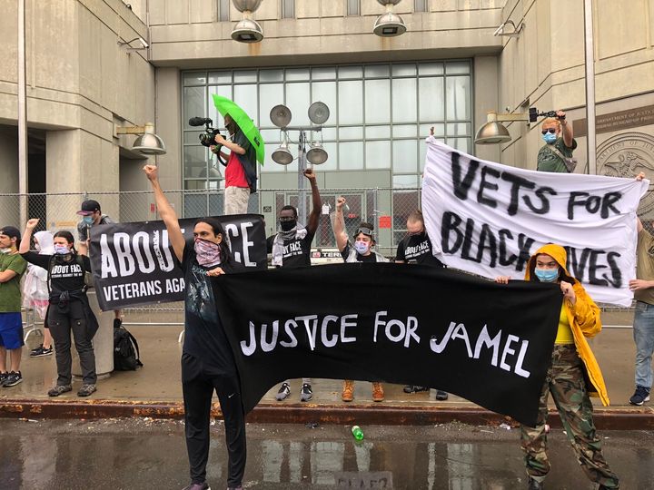 Protesters gather at the Metropolitan Detention Center in Brooklyn, where a 35-year-old inmate, Jamel Floyd, died in custody Wednesday after guards pepper-sprayed him in his cell.