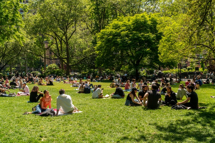 Visitors to Madison Square Park in New York enjoy the lawn while social distancing on Memorial Day, Monday, May 25, 2020. (Photo by Richard B. Levine)