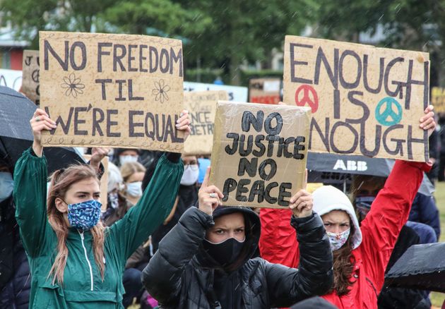 People gathered in Cambridge to hold a peaceful demonstration as part of a worldwide Black Lives Matter solidarity march on Sunday