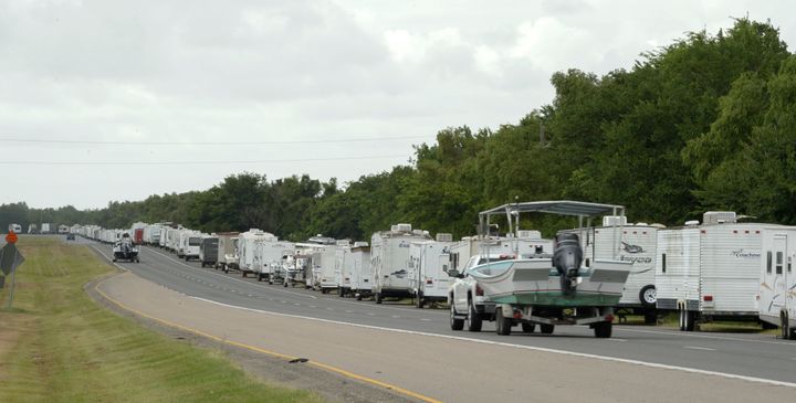 Recreational trailers and boats are parked along LA-46 inside the levee gates in anticipation of Tropical Storm Cristobal in St. Bernard Parish, La., Saturday, June 6, 2020. (Max Becherer/The Times-Picayune/The New Orleans Advocate)