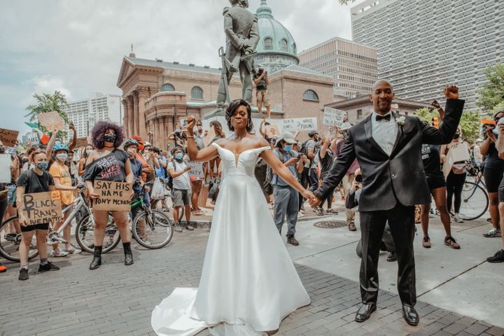 Photographer Linda McQueen captured this moment of the couple raising their fists in the heart of the downtown Philadelphia protest. 