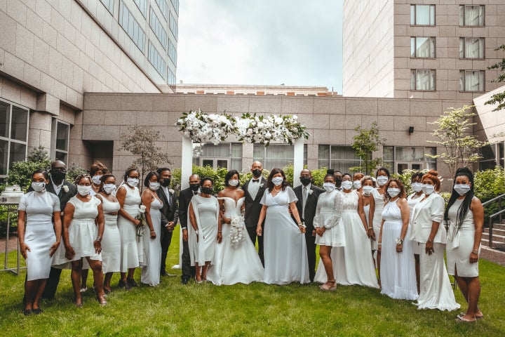 Face masks and hand sanitizer were provided to guests, who were encouraged to wear white. 