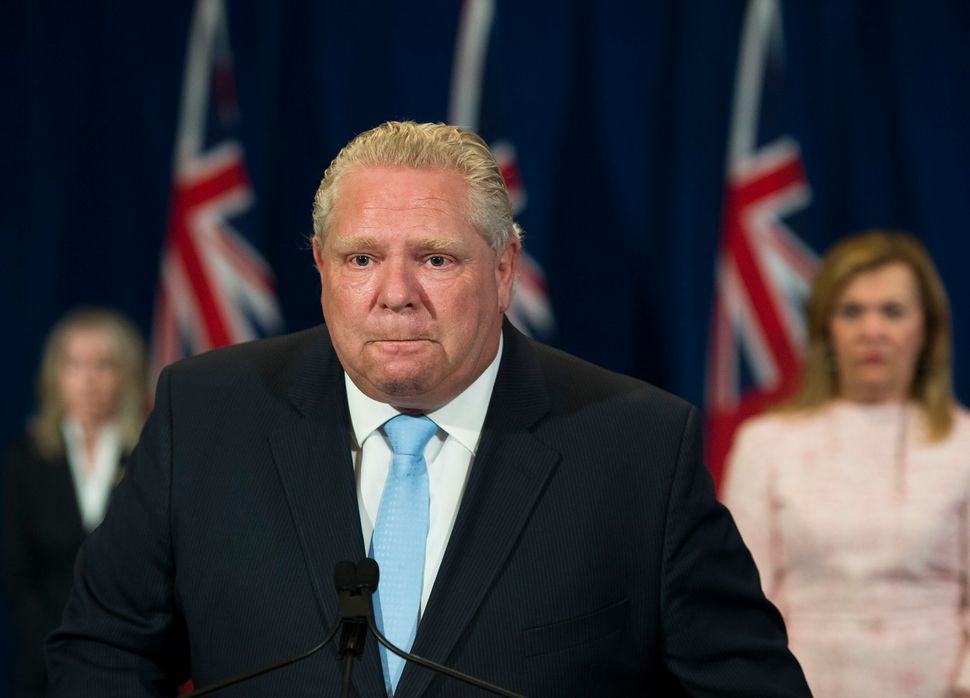 Ontario Premier Doug Ford fights back tears in Toronto on May 26, 2020 as he discusses a disturbing report from the Canadian military about five long-term care homes. Family members of residents at Orchard Villa had been trying to warn Ford about the conditions for weeks.