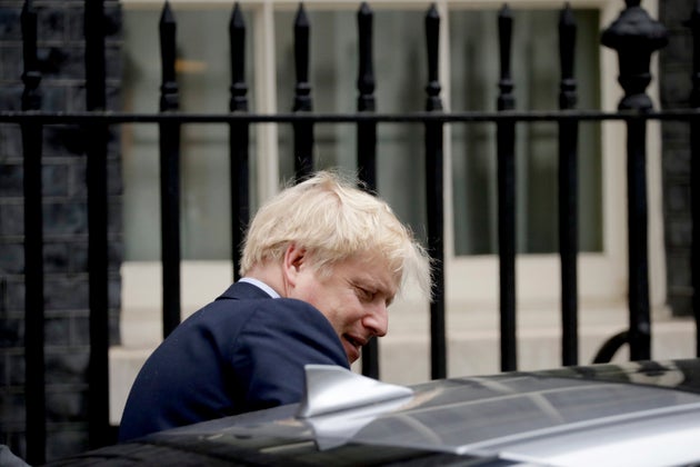 British Prime Minister Boris Johnson gets in a car as he leaves 10 Downing Street in London.