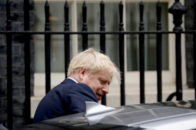 British Prime Minister Boris Johnson gets in a car as he leaves 10 Downing Street in London. 