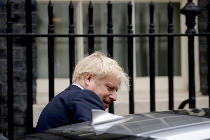 British Prime Minister Boris Johnson gets in a car as he leaves 10 Downing Street in London. 