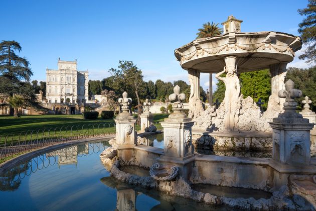 Rome, Italy-February 23, 2015: Fountain of Cupido and Cassino del Bel Respiro or Villa Doria Pamphili...